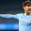 Un joueur de Manchester City en match sous le maillot bleu ciel.